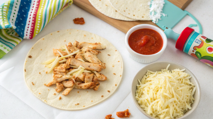 Ingredients for cheesy chicken tortilla roll-ups