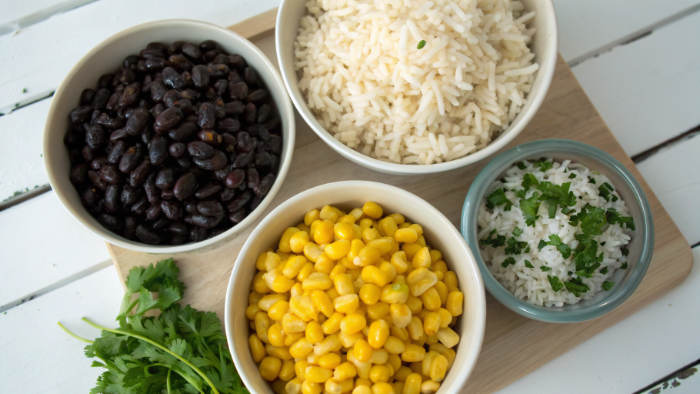 Assembling a healthy chicken veggie rice bowl