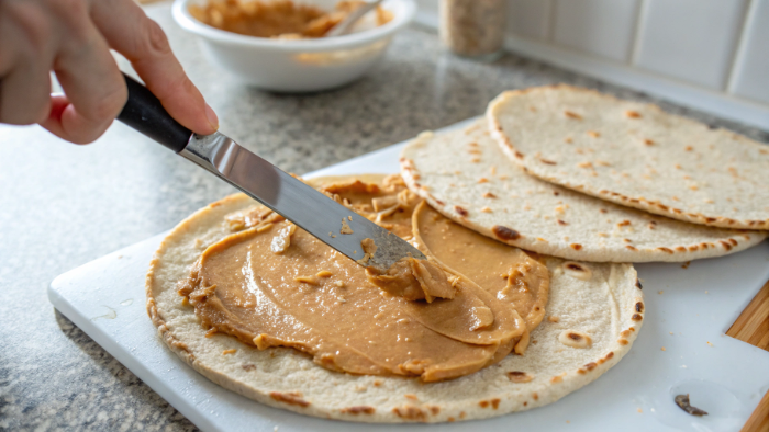 Adding banana on tortilla